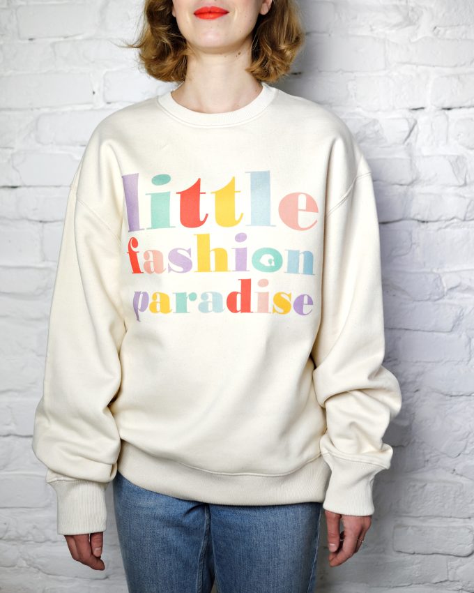 Ana wears white oversized retro sweatshirt from lfp collection