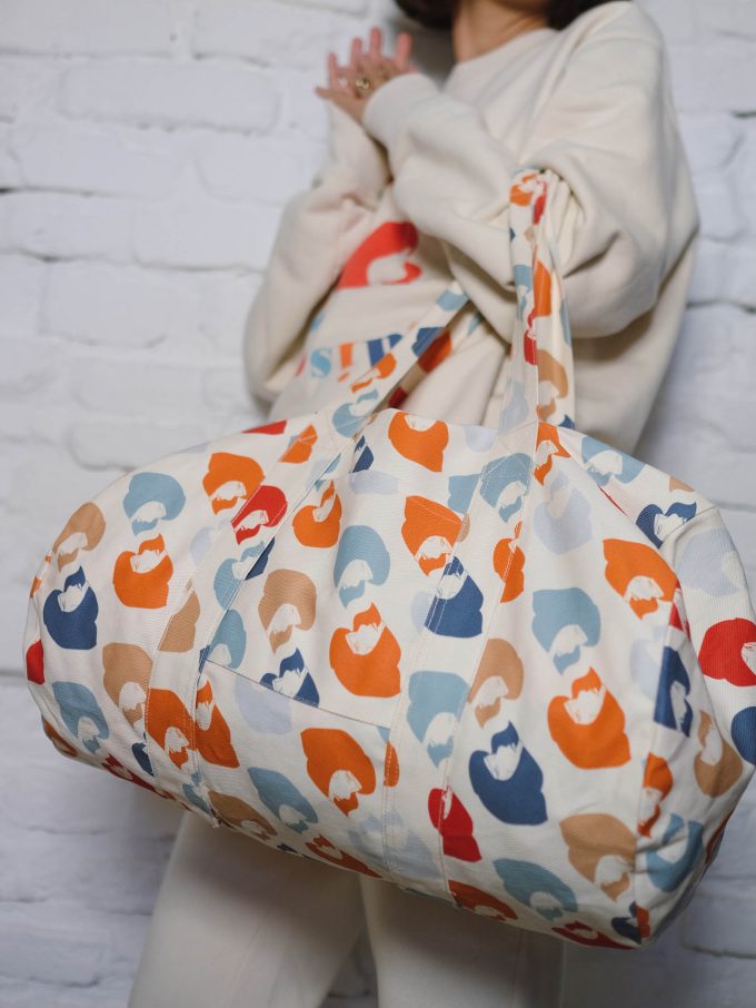 Ana Bacinger with her large white bag with blue, orange, red and brown details