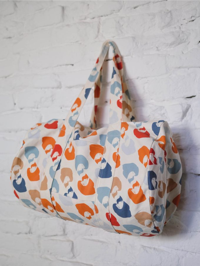 Large white bag with blue, orange, red and brown details from LFP collection