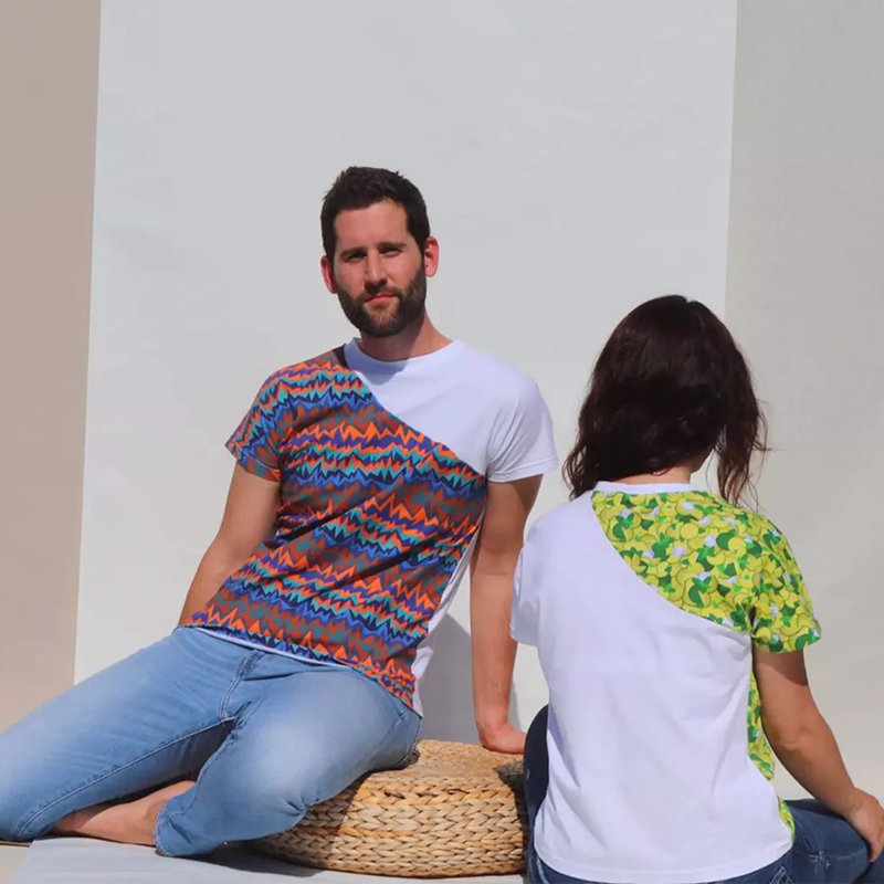 girl and boy sitting on the floor in their casual unique T-shirts